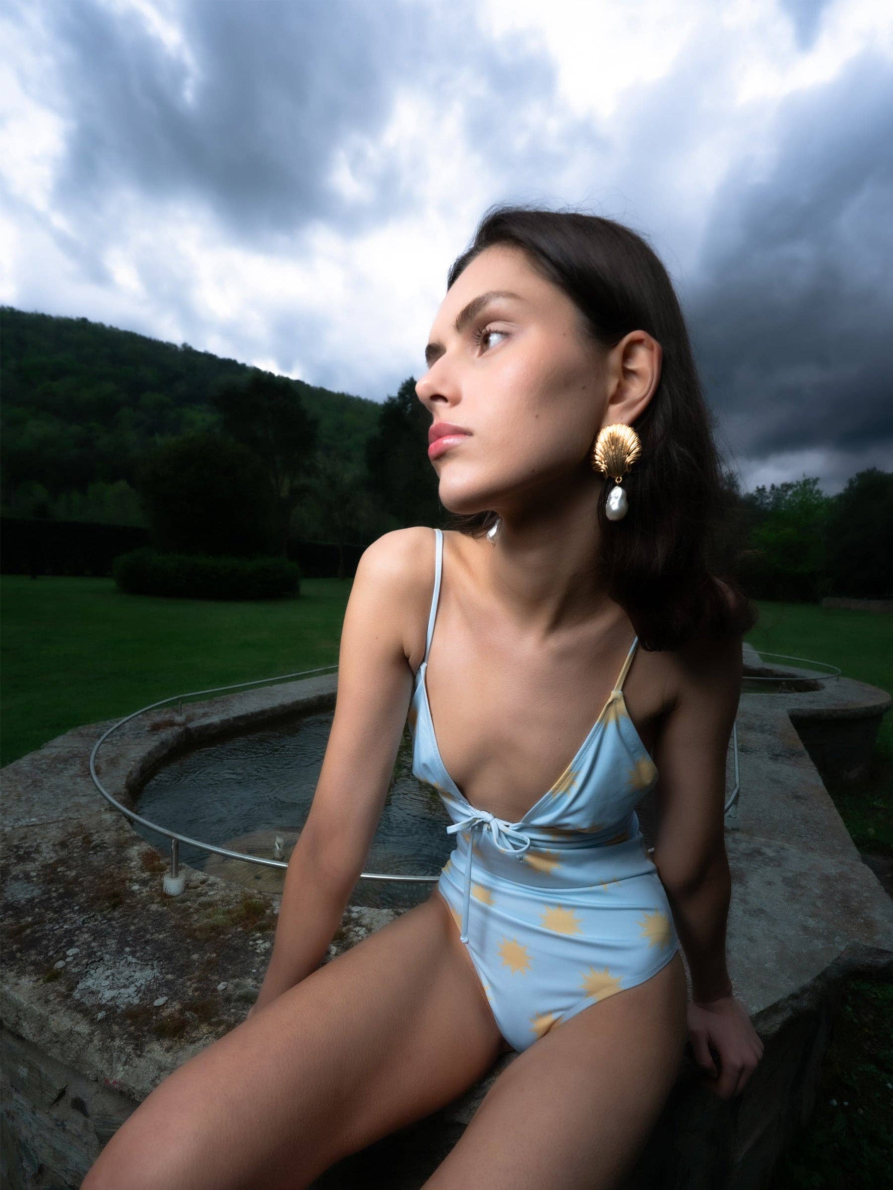 Light Blue One-Piece Swimsuit with Yellow Sun Print