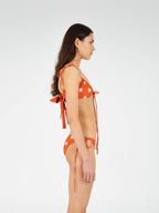 Top bikini rosso con stampa